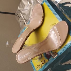 Clear sandals with block heel. Tried on but not warn outside of house.